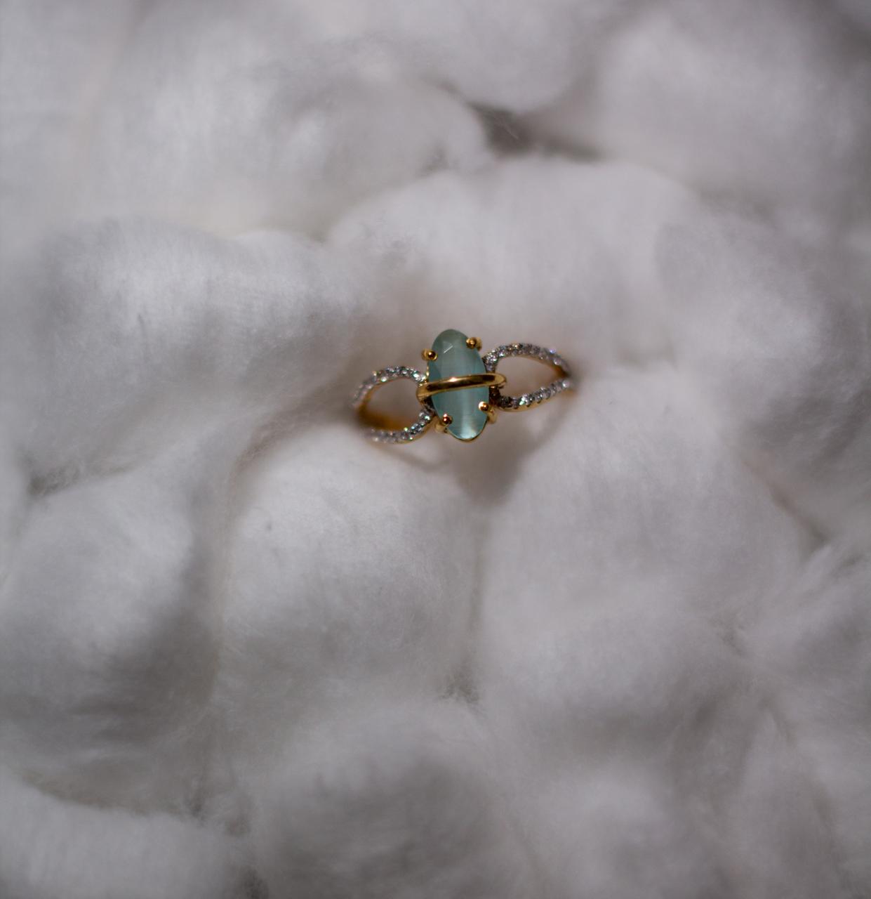 Gold Ring with Green Stone and Crystal Loop Design - 1